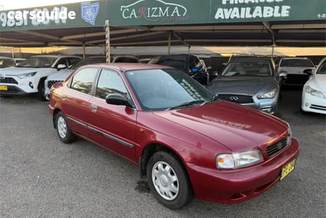 Red 1997 Suzuki Baleno Sedan Gl