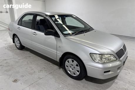 Silver 2003 Mitsubishi Lancer Sedan Es