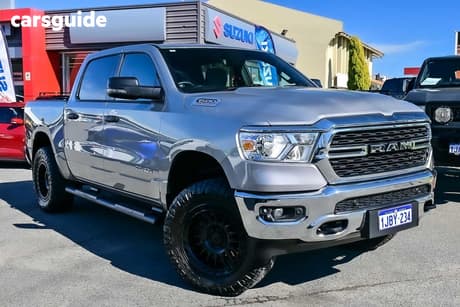 Silver 2023 RAM 1500 Crew Cab Utility Big Horn (5-7 Tub) Mhev (4X4)