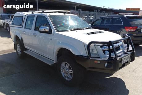 White 2010 Isuzu D-MAX Crew Cab Utility Ls-U (4X4)