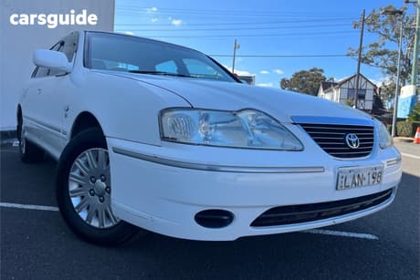 White 2003 Toyota Avalon Sedan Conquest