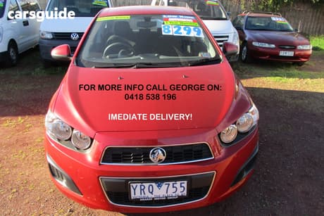 Red 2012 Holden Barina Hatchback Cd