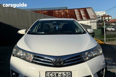 White 2014 Toyota Corolla Sedan Sx