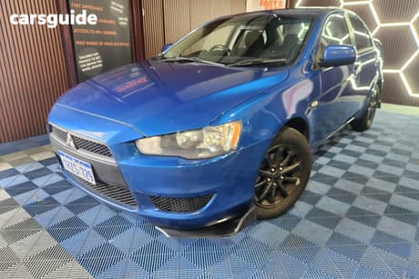 Blue 2011 Mitsubishi Lancer Sedan Sx