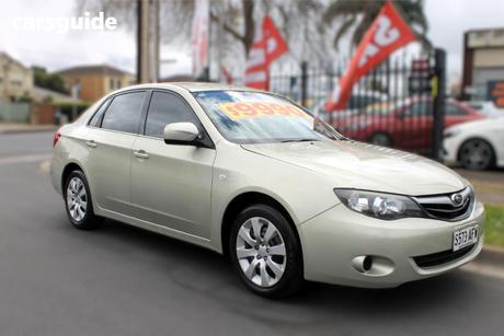 Gold 2010 Subaru Impreza Sedan R (Awd)