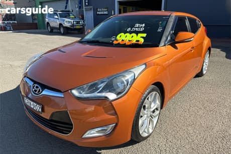 Orange 2014 Hyundai Veloster Coupe