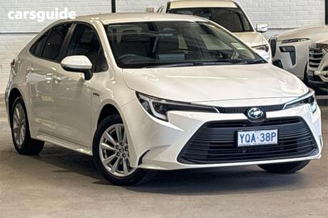 White 2023 Toyota Corolla Sedan Ascent Sport Hybrid
