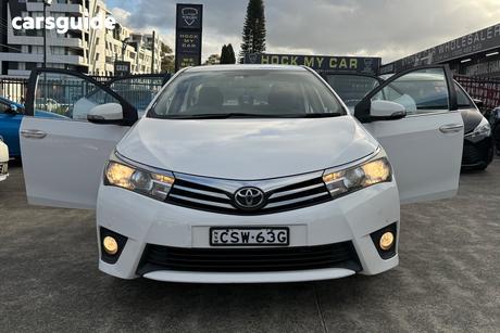 White 2014 Toyota Corolla Sedan Sx