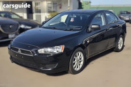 Black 2011 Mitsubishi Lancer Sedan Es