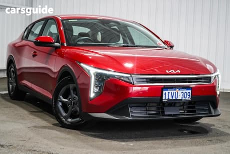 Red 2025 Kia K4 Sedan S