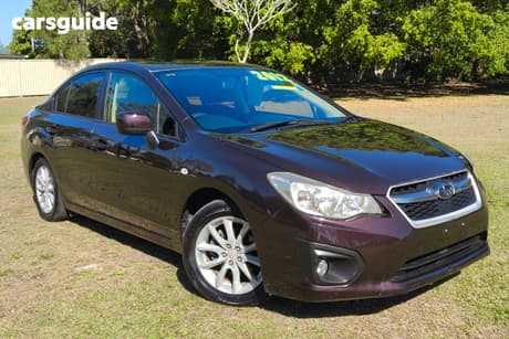 Red 2012 Subaru Impreza Sedan 2.0I-L (Awd)