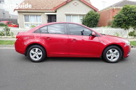 Red 2010 Holden Cruze Sedan Cd