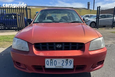 Orange 2000 Hyundai Accent Sedan Gl