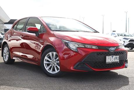 Red 2023 Toyota Corolla Hatchback Ascent Sport Hybrid