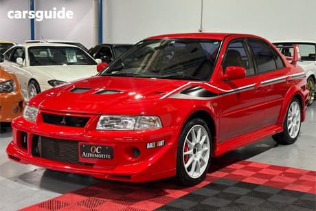 Red 1999 Mitsubishi Lancer Sedan EVOLUTION 6.5 TOMMI MAKINEN EDITION