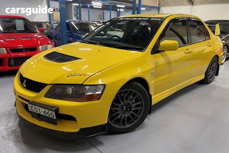Yellow 2007 Mitsubishi Lancer Sedan Evolution Ix