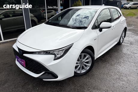 White 2024 Toyota Corolla Hatchback Ascent Sport Hybrid