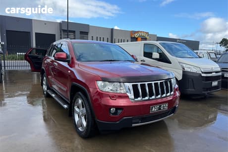 Red 2013 Jeep Grand Cherokee Wagon Limited (4X4)