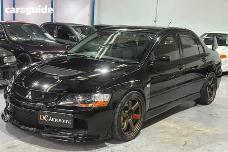 Black 2006 Mitsubishi Lancer Sedan Evolution Ix