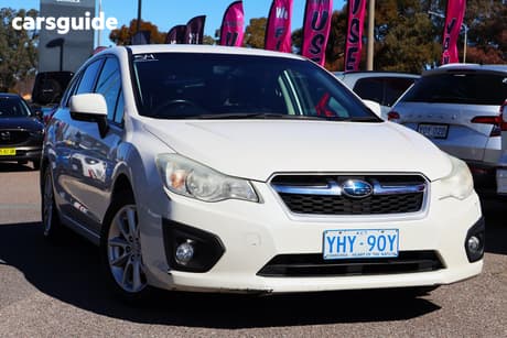 White 2012 Subaru Impreza Hatchback 2.0I (Awd)