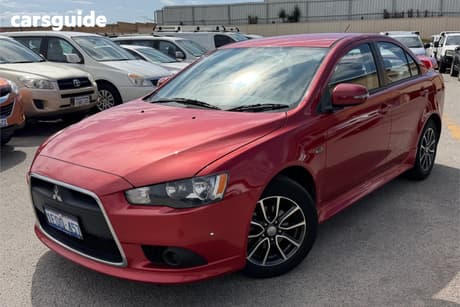 Red 2014 Mitsubishi Lancer Sedan Es Sport