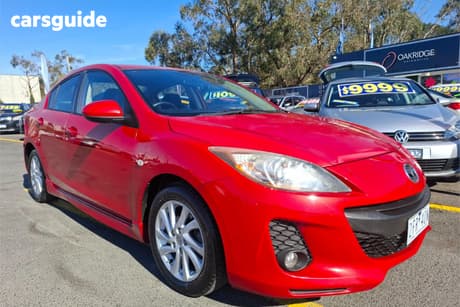 Red 2011 Mazda 3 Sedan Maxx Sport