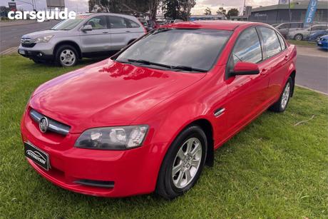 Red 2009 Holden Commodore Sedan Omega