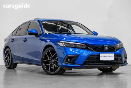 Blue 2024 Honda Civic Hatchback E:Hev Lx