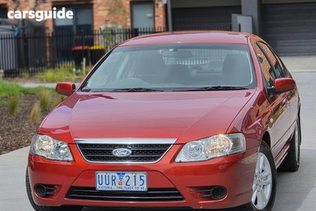 Orange 2007 Ford Fairmont Sedan (Lpg)