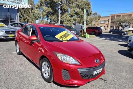 Red 2011 Mazda 3 Sedan Neo