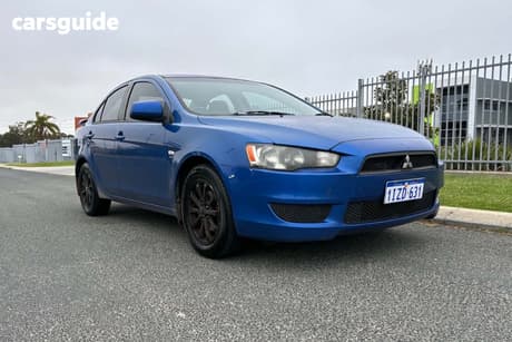 Blue 2010 Mitsubishi Lancer Sedan Sx
