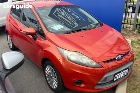 Orange 2012 Ford Fiesta Sedan Lx