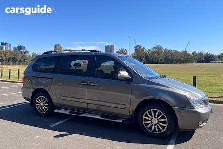 Silver 2011 Kia Grand Carnival Wagon Platinum