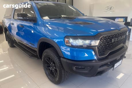 Blue 2025 RAM 1500 Crew Cab Utility Rebel Hurricane