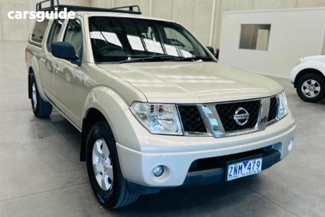 Beige 2011 Nissan Navara Dual Cab Pick-up Rx (4X2)
