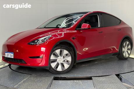 Red 2023 Tesla Model Y Wagon Rear-Wheel Drive