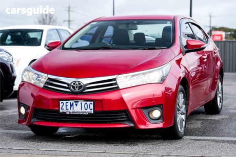 Red 2016 Toyota Corolla Sedan Ascent