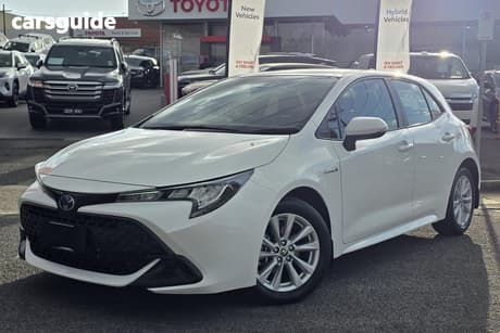 White 2023 Toyota Corolla Hatchback Ascent Sport Hybrid