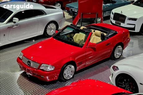 Red 1991 Mercedes-Benz 300SL Convertible 129