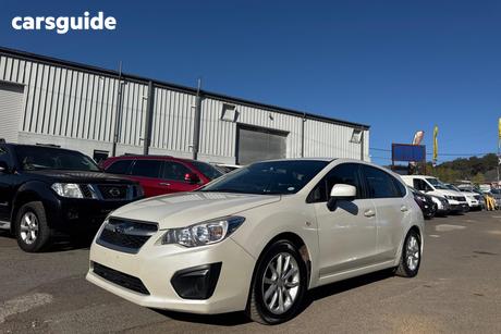 White 2014 Subaru Impreza Hatchback 2.0I (Awd)
