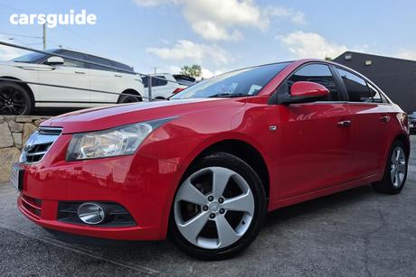 Red 2010 Holden Cruze Sedan Cdx