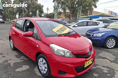 Red 2011 Toyota Yaris Hatchback Yr