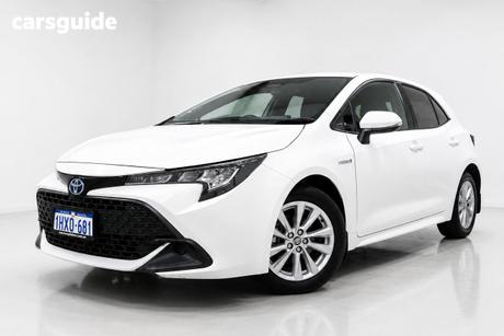 White 2023 Toyota Corolla Hatchback Ascent Sport + Conv Pk Hybrid