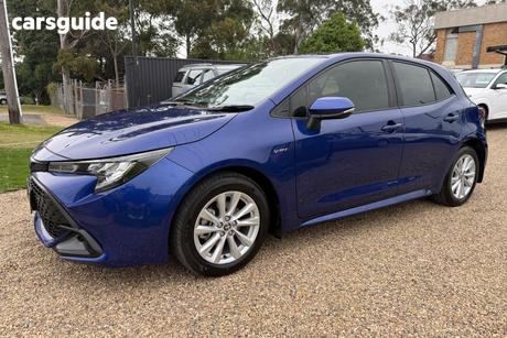 Blue 2024 Toyota Corolla Hatchback Ascent Sport + Conv Pk Hybrid