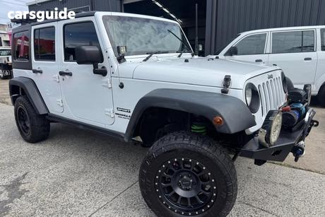 White 2012 Jeep Wrangler Softtop Unlimited Sport (4X4)