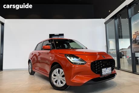 Orange 2024 Suzuki Swift Hatchback Hybrid