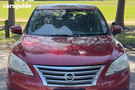 Burgundy 2013 Nissan Pulsar Sedan St