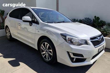 White 2015 Subaru Impreza Hatchback 2.0I Premium (Awd)