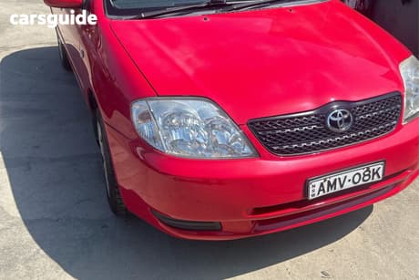 Red 2002 Toyota Corolla Hatchback Conquest Seca