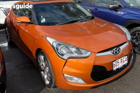 Orange 2011 Hyundai Veloster Hatch + F